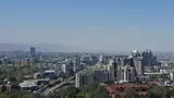 Панорама Алматы на фоне гор Заилийского Алатау